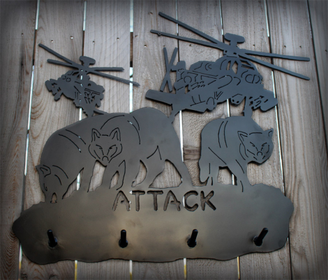 A coat rack with 2 Apache helicopters with 3 wolves