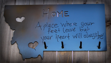 Coat rack with a quote about Home