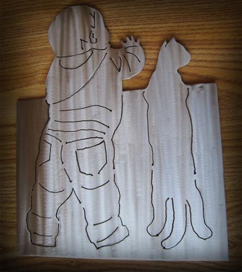 Kid and cat wall art modeled after a photo